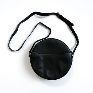 Rachel Roy Black Vegan Leather Circle Crossbody with Silver Tone Hardware